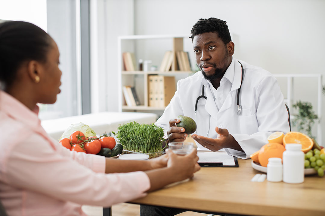 Dietitian explaining healthy choices to a client