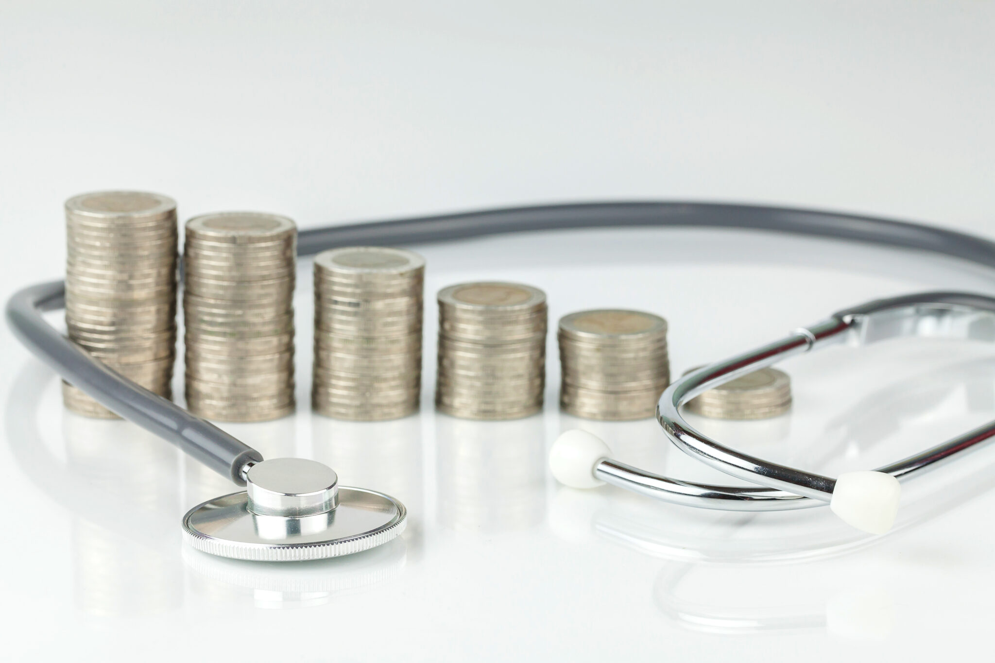 Coin stacks inside a stethoscope